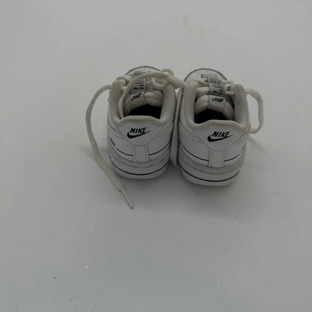 Nike Air Force One white unisex kids Athletics sneakers size 5C